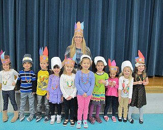 Neighbors | Alexis Bartolomucci.Samantha Cox and her students dressed in their Pilgrim and Indian hats for their Thanksgiving feast at North Preschool on Nov. 22.