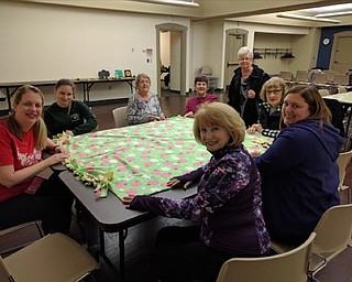 Neighbors | Submitted.YAPA Members worked on a no-sew blanket for Making Kids Count. Pictured are, from left, Amy Banks, Jennifer Rinehart, Arlene Farris, Angie Bilkie, Sally Ocker, Barbara Banks, Lynn Sorber and Katie Shipka.