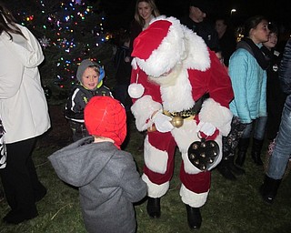 Neighbors | Alexis Bartolomucci.One of the children at the tree lighting at Akron Children's Hospital in Boardman on Dec. 1 met and talked to Santa Claus.
