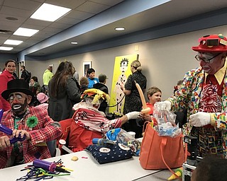 Neighbors | Alexis Bartolomucci.Clowns made balloon animals for guests at the tree lighting event at Akron's Children Hospital in Boardman on Dec. 1.