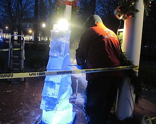 Neighbors | Alexis Bartolomucci.Jeff Kaiser from Sub-Zero Hand Crafted Ice Sculptures carved a Christmas tree out of ice for the Lighting of the Village event in Poland on Dec. 3.