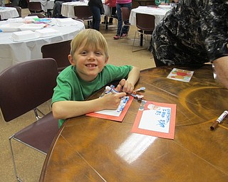 Neighbors | Alexis Bartolomucci.Jack wrote letters to Santa Claus during the Cookies with Santa event on Dec. 21 at Boardman Park.