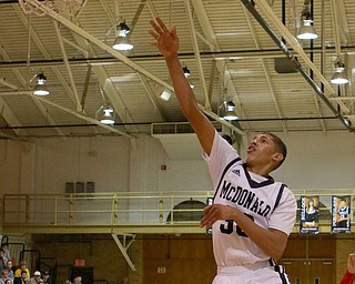 Braedon Poole (30) puts up an uncontested layup during the third quarter of Friday nights matchup against Niles High School at McDonald High School.  Dustin Livesay  |  The Vindicator  12/30/16  McDonald.