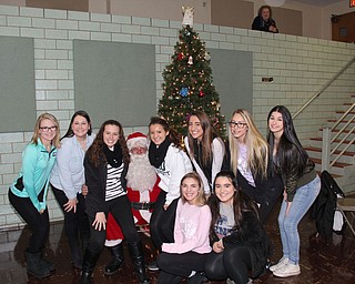 SPECIAL TO THE VINDICATOR
Since 1955, Struthers Rotary has hosted a Christmas party for special-needs children in the county. This year, the club hosted more than 200 children and teachers from Struthers, Campbell, Lowellville, Austintown and Youngstown. Members of Struthers Parkside Church provided lunch and the Grotto clowns provided entertainment. Struthers Interact Club also assists with the party. Student volunteers, in front from left, are Tessa Stocker and Jenna Kish. In back are Megan Stewart, Jessica Tirone, Karli Shives, Peyton McLaughlin, Torre Smrek, Amanda Zupko and Maci Musolino.