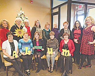 SPECIAL TO THE VINDICATOR
Youngstown Alumnae Panhellenic Association members attending the holiday luncheon, from left, are Jayne Boucherle, Sharman Simon, Lucy Setz, Marion Calpin and Paulette Malie, and in back, Kim Davis, Suzanne Brown, Dorothy Melody, Lynn Sorber, Carol Havrilla, Sally Ocker, Jackie Stambaugh, Kimberly Russell and Amy Banks. Below, YAPA “Smart Cookie” bakers help prepare care packages for Youngstown State University students during finals week. From left are Mary Ellen Willmitch and Jennifer Rinehart, both of Alpha Sigma Tau Sorority.