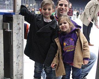 Jeremy Miller poses for a photo with his son, Dominic(7) and daughter, Lena(3) while ice skating during First Night Youngstown at the the Covelli Centre in Youngstown on Saturday, Dec. 31, 2016...(Nikos Frazier | The Vindicator)..