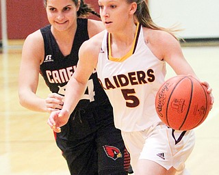  William D. Lewis The vindicator  South Range's Felicia Gaeta(5) drives around Canfield's Serena Sammarone(54) during 1-2-17 action at south range.