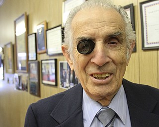 William D. Lewis The Vindicator Longtime downtown watch repairman Nicholas Yurchyk at work in his Federal St shop 12302016