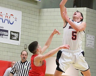 Struthers guard Andrew Carbon(5) flies towards the basket during the fourth quarter as The Struthers Wildcats takes on the Edgewood Warriors at the Struthers High School Fieldhouse in Struthers on Tuesday, Jan. 3, 2017. Struthers won, 55-45...(Nikos Frazier | The Vindicator)..
