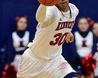WARREN, OHIO - JANUARY 3, 2017: Aaron Williamson #30 of JFK gains control of the ball while dribbling up court in transition during the first half of their game Tuesday night at John F. Kennedy High School. DAVID DERMER | THE VINDICATOR