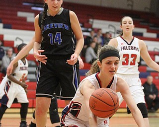 Fitch guard Gina DiFrancesco (3) falls after bumping into Lakeview senior Camie Becker (14) during the second quarter as the Fitch Falcons take on the Lakeview Bulldogs at the Austintown Fitch High School Gymnasium  in Austintown on Wednesday, Jan. 4, 2017. Lakeview won, 44-36...(Nikos Frazier | The Vindicator)..