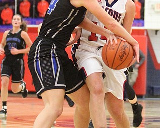 Lakeview senior Camie Becker (14) rips the ball from Fitch junior guard Camryn Constance (14) during the fourth quarter as the Fitch Falcons take on the Lakeview Bulldogs at the Austintown Fitch High School Gymnasium  in Austintown on Wednesday, Jan. 4, 2017. Lakeview won, 44-36...(Nikos Frazier | The Vindicator)..