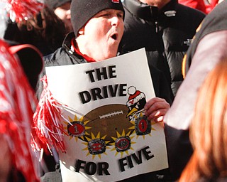        ROBERT K. YOSAY  | THE VINDICATOR..Vic Romack of Warren cheers and wants the " drive for five to be a reality" ..YSU Fans  gathered at Youngstown State University to  send off the Penguins to the FCS National Championship in Frisco, Texas against James Madison University. - ...- -30-...