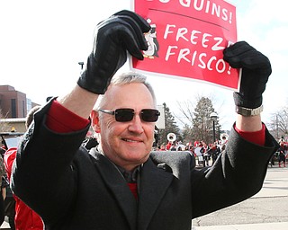        ROBERT K. YOSAY  | THE VINDICATOR..YSU  #1 Fan as President YSU Jim Tressel urges on the team......YSU Fans  gathered at Youngstown State University to  send off the Penguins to the FCS National Championship in Frisco, Texas against James Madison University. - ...- -30-...