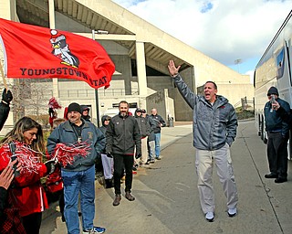        ROBERT K. YOSAY  | THE VINDICATOR..Coach Bo Pelini.... waves and thanks the crowd at YSU..YSU Fans  gathered at Youngstown State University to  send off the Penguins to the FCS National Championship in Frisco, Texas against James Madison University. - ...- -30-...