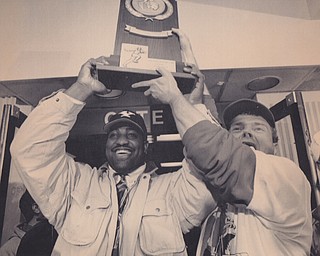 JIMMY KOCACH OF LIBERTY HELPS HOIST THE CHAMPIONSHIP PLAQUE. KOCACH HAS BEEN A FAN OF THE PENGUINS SINCE 1976. Dec. 17, 1994 Bob DeMay | The Vindicator File PhotoDec. 17, 1994 LISA KYLE | The Vindicator File Photo