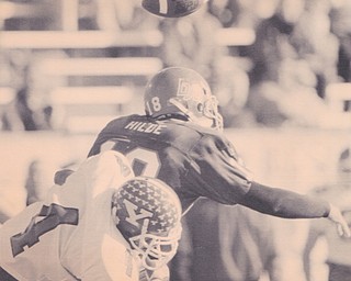 boise state quarterback tony hild (18) is blindsided by youngstown state's vance mayes (4) in the third quarter of the NCAA Div. I-AA championship game saturday, dec. 17, 1994. in Huntington w.V. the play was ruled an incomplete pass. jan 1, 1994 Bob DeMay | The Vindicator File Photo
