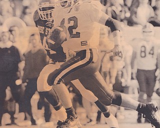 ysu QB mark brungard races 35 yards to the end zone on a quarter back draw late i the second quarter. Dec. 17, 1994 Bob DeMay | The Vindicator File Photo
