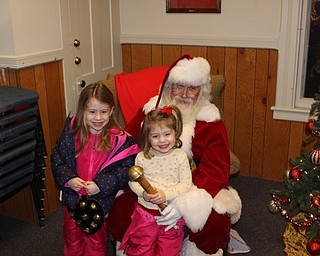 Neighbors | Abby Slanker.Kiera and Anna Fitzgerald visited Santa at Township Hall during the Rotary Club of Canfield’s annual Lighting of the Green on Dec. 2.