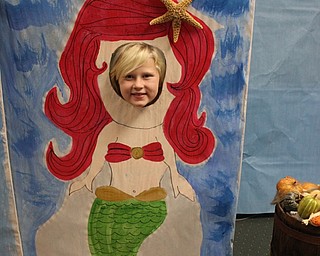 Neighbors | Abby Slanker.A C.H. Campbell Elementary School second-grader had some fun with the pirate-themed decorations at the school’s annual book fair on Nov. 19.