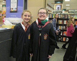 Neighbors | Alexis Bartolomucci.Kaleigh Williams and Abby Weimer dressed up for the Harry Potter Holiday Ball on Dec. 9 at the Boardman Barnes and Noble.