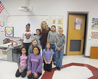 Neighbors | Alexis Bartolomucci.Fourth-grade students from Robinwood Lane Elementary stood with WFMJ's Candace Monacelli after she spoke with them about weather.