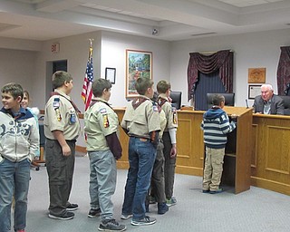 Neighbors | Alexis Bartolomucci.Cub Scouts Pack 25 lined up to stand at the podium at Canfield City Hall on Dec. 5 in front of Mayor Bernie Kosar.