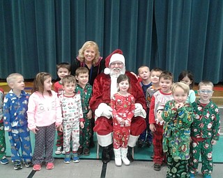 Neighbors | Alexis Bartolomucci.Joy Bucci and her class got a visit from Santa Claus on Dec. 15 during their Polar Express day at Poland North Preschool.