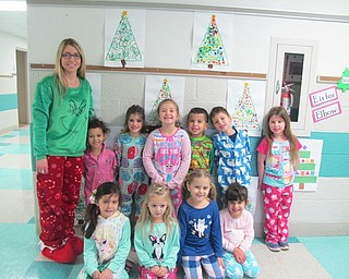 Neighbors | Alexis Bartolomucci.Samantha Cox and her class at Poland North Preschool dressed in their pajamas to celebrate Polar Express Day on Dec. 13.