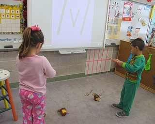 Neighbors | Alexis Bartolomucci.Students fished for candy canes during their Polar Express Day on Dec. 13 at Poland North Preschool.