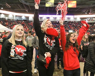        ROBERT K. YOSAY  | THE VINDICATOR..Celebration as YSU makes a great defensive play.. as Laura Verb of Austintown Lexi Timko of Howland and Chynna Thompson of Hubbard cheer for their "guins"
