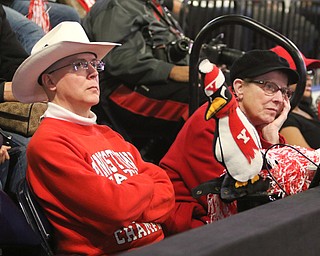        ROBERT K. YOSAY  | THE VINDICATOR..A longer second half as Rick Alcorn and his Mom Carol watch as a YSU drive gets stopped..a near capacity crowd watched as YSU battled James Madison for the Championship- finally falling behind before the half and never caught up- ..