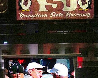        ROBERT K. YOSAY  | THE VINDICATOR..Coach bo pelini.. as he discusses another referee call... the Covelli had three high def LED TV and two Jumbotrons for the crowd to watch the game..a near capacity crowd watched as YSU battled James Madison for the Championship- finally falling behind before the half and never caught up- ..