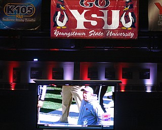        ROBERT K. YOSAY  | THE VINDICATOR..Coach bo pelini.. as he discusses another referee call... the Covelli had three high def LED TV and two Jumbotrons for the crowd to watch the game..a near capacity crowd watched as YSU battled James Madison for the Championship- finally falling behind before the half and never caught up- ..