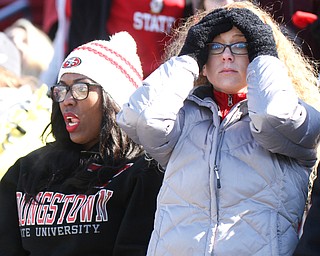 William D Lewis The Vindicator YSU tudents Tierney McCastre, left, and Jeri Wethli(correctO watch the closing minutes  playoff loss.