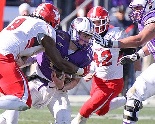 William D Lewis The Vindicator YSU Aver Moss)9) and Armand Dellavade(42) put pressure on JMU QB Bryan Schor(17) during  playoff loss.