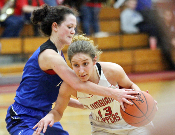 William D. Lewis The Vindicator Lisbon's Karlee Pezzano(2) tries to get the ball from Columbiana's Mariah Rovnak(13) during Jan. 9, 2017 action at Columbiana.