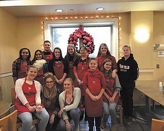 SPECIAL TO THE VINDICATOR:  Students from the Interact Club at Canfield High School spent a day during winter break preparing home-cooked meals for 55 guest families at the Ronald McDonald House in Cleveland. The meal provided a much-needed service to the families, who often do not have the time, energy or money to prepare a healthy meal during their stay. The Canfield students, along with Superintendent Alex Geordan and his family, prepared ham, pirogi, green beans and cookies, and also visited the hospital. The students are, front, from left, Isabelle Nuppnau, Candice Karykovich, Felia Busk, Gavin English and Cora Campbell; and, back, from left, Marissa Roberts, Elyjah Bailes, Arianna Geordan, Sarah Miller, Shelby Byrne, Remi Mikan, Carly Campbell and Preston English.