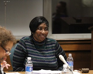 Board president Brenda Kimble smiles as board member Dario Hunter criticizes her time as president of the Youngstown City School Board during the reorganizational meeting at the Youngstown City School Board of Education in Youngstown on Tuesday, Jan. 10, 2017. ..(Nikos Frazier | The Vindicator).