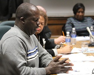 Board member Jerome Williams questions the path the conversation is going down during the reorganizational meeting at the Youngstown City School Board of Education in Youngstown on Tuesday, Jan. 10, 2017. ..(Nikos Frazier | The Vindicator).