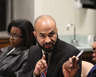 Board member Dario Hunter argues during the reorganizational meeting at the Youngstown City School Board of Education in Youngstown on Tuesday, Jan. 10, 2017. ..(Nikos Frazier | The Vindicator).
