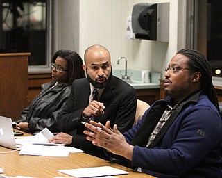Board member Dario Hunter argues with Ronald Shadd during the reorganizational meeting at the Youngstown City School Board of Education in Youngstown on Tuesday, Jan. 10, 2017. ..(Nikos Frazier | The Vindicator).