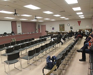 Parents and School staff wait for the adjournment of the reorganizational meeting which started at 5:30 p.m. for the regular board meeting to begin at 7:30 at the Youngstown City School Board of Education in Youngstown on Tuesday, Jan. 10, 2017. This photo, taken at 7:39 p.m shows the reorganizational meeting was still not adjourned. ..(Nikos Frazier | The Vindicator)..