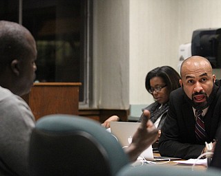 Board member Dario Hunter argues during the reorganizational meeting at the Youngstown City School Board of Education in Youngstown on Tuesday, Jan. 10, 2017. ..(Nikos Frazier | The Vindicator).
