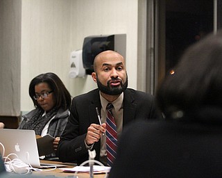 Board member Dario Hunter agues during the reorganizational meeting at the Youngstown City School Board of Education in Youngstown on Tuesday, Jan. 10, 2017. ..(Nikos Frazier | The Vindicator)..