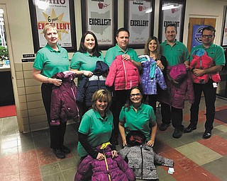 SPECIAL TO THE VINDICATOR: Top Flite Financial employees donated 37 new coats that will be given to students in Boardman’s four elementary schools who need them. Mandy Sirocco, counselor at West Boulevard Elementary, accepted the donation on Jan. 3 at the school. Pictured are (front, from left) Pam Hernandez and Mary Jo Kollat; and (rear, from left) Mary Ann Pollock, Philadelphia Howells, Skip Weber, Sirocco, Ryan Cuffle and Mark Chuey.