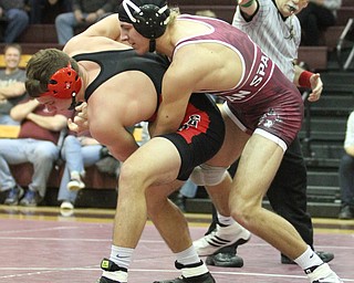 Boardman 170 pound wrestler Michael O'Horo(red) and Canfield 170 pound wrestler Nick Crawford(Black) as Boardman High School Takes on Canfield High School at the Boardman High School Gymnasium  in Boardman on Wednesday, Jan. 11, 2017. ..(Nikos Frazier | The Vindicator)..