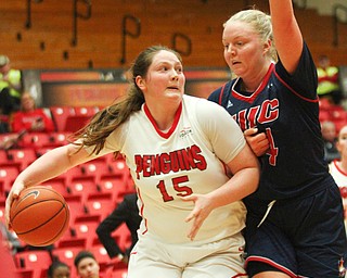 William D. Lewis The Vindicator YSU's Mary Dunn(15) drives aroud UIC's Tyra Carlsten - Handberg(14) during Jan 12 , 2017 action at YSU.