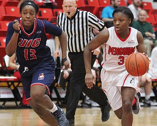 William D. Lewis The Vindicator YSU's Indiya Benjamin(3) drives aroud UIC's Kiki Bynes(13) during Jan 12 , 2017 action at YSU.