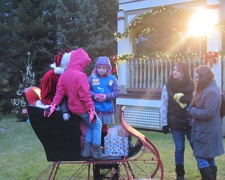Neighbors | Alexis Bartolomucci.Guests got to visit and get a picture with Santa Claus on Dec. 4 for the Community Christmas event at Boardman Park.